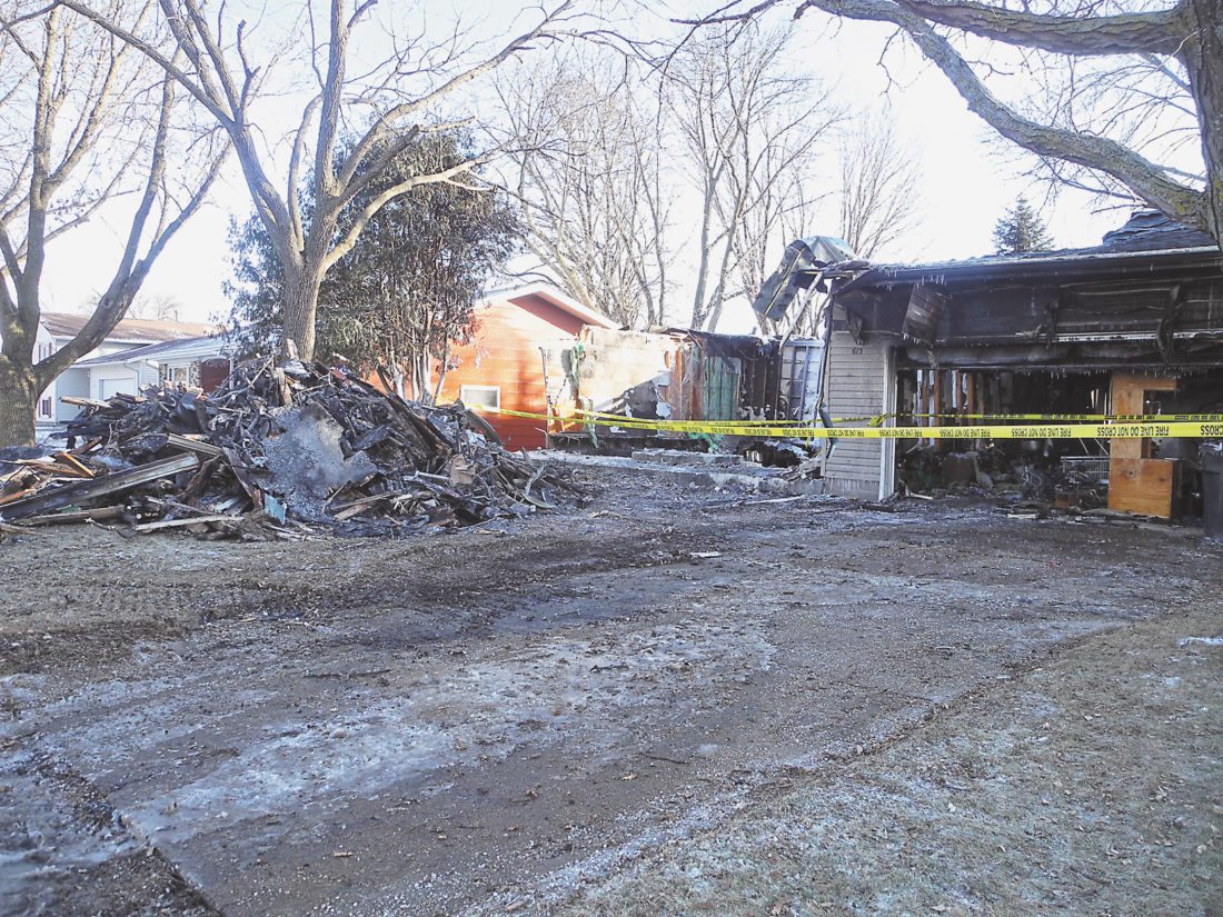 Neighbors of house fire victim say flames seemed to spread quickly
